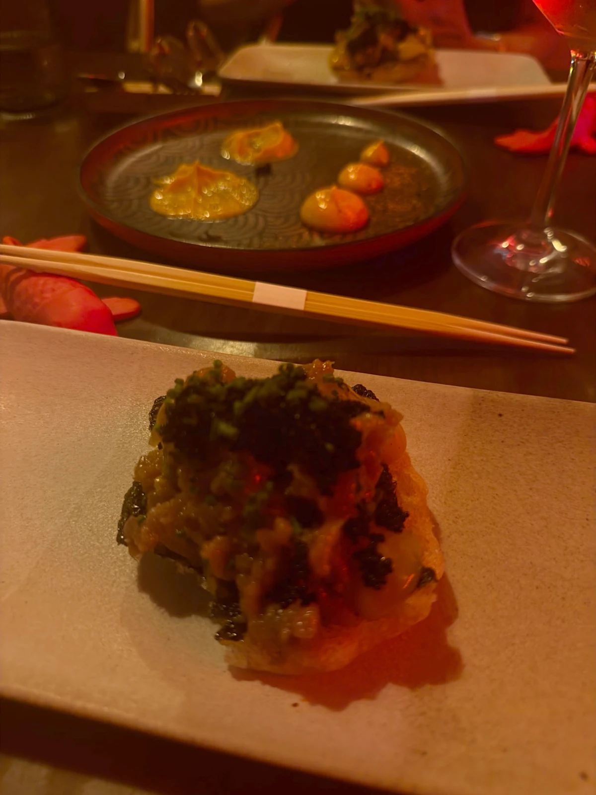 Plated dishes and chopsticks during dinner at Yuki restaurant in Funchal